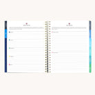 Teacher planner open to weekly routine spread