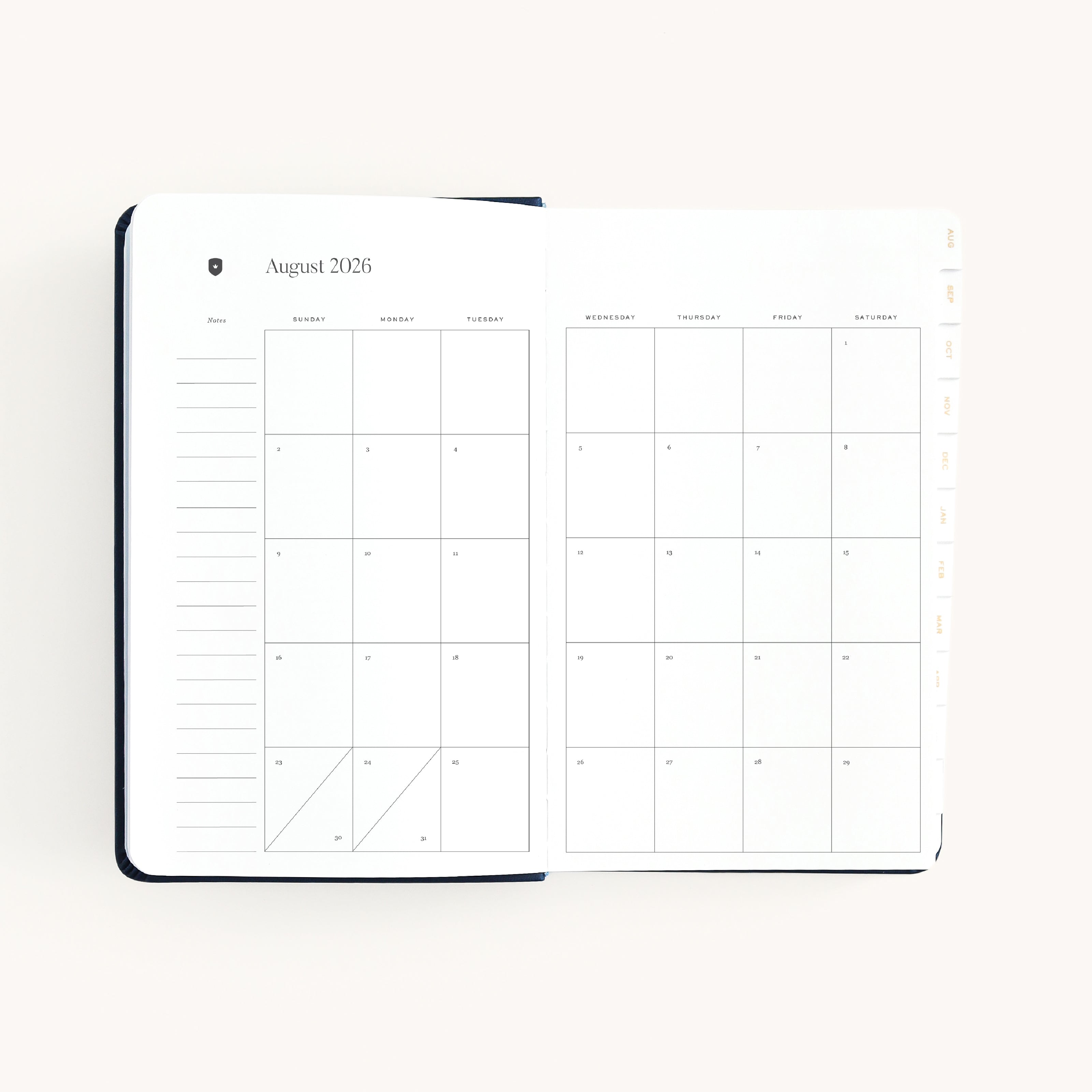 August monthly spread in daily dapperdesk planner with clean calendar grid for planning ahead, setting goals, and tracking priorities