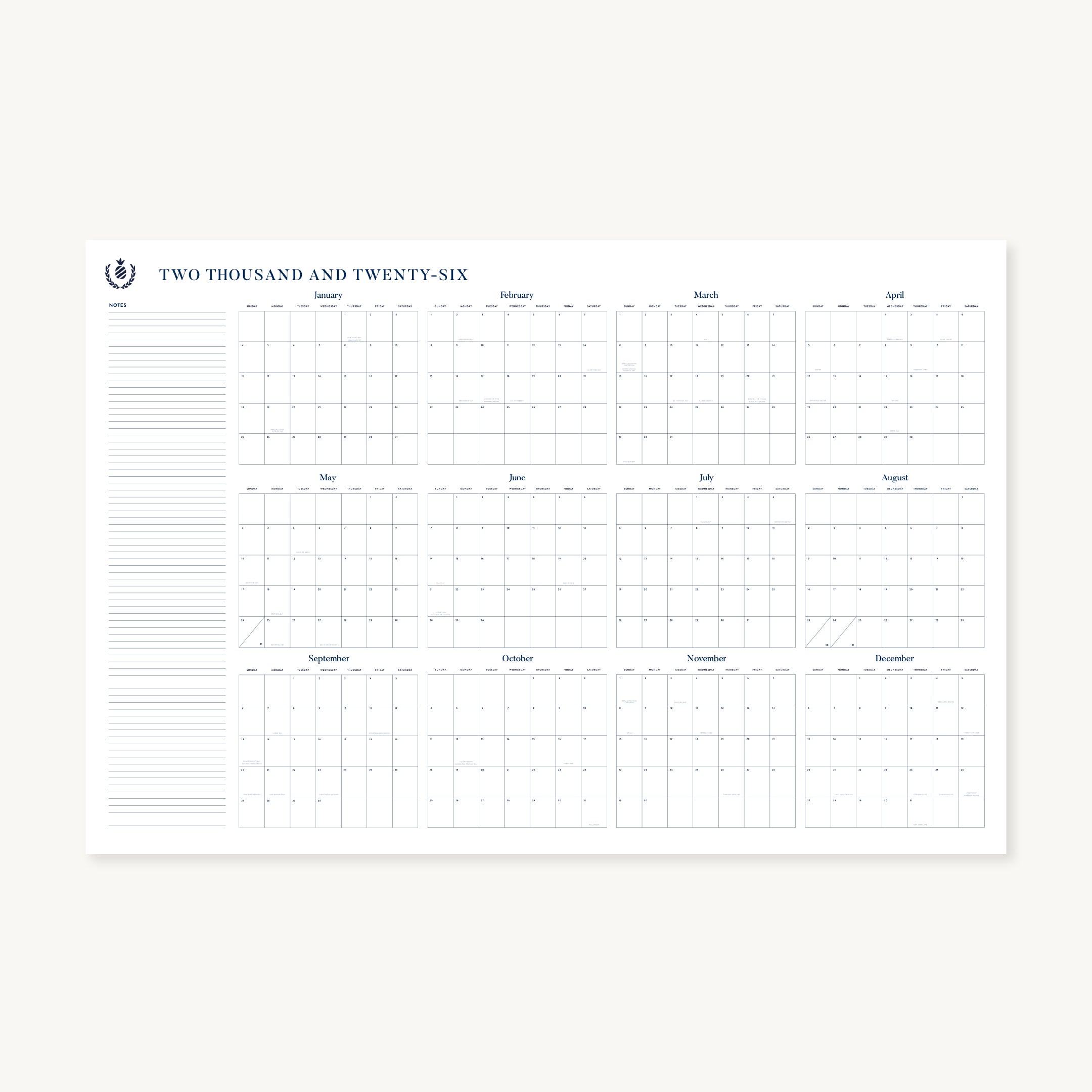 The Simplified 2026 Wall Calendar - Printable features all twelve months in a grid, a left notes section, and “Two Thousand and Twenty-Six” at the top. This digital download has a minimalist design with a clean, light background.
