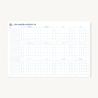 The Simplified 2026 Wall Calendar - Printable shows all twelve months in a grid, each with its own section, and features a lined notes area on the left plus a simple crest logo in the top left corner.