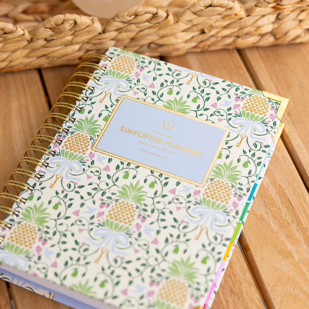 Pineapple Charm spiral daily planner styled in an elegant workspace with cheerful details for organized daily planning