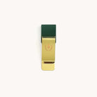 Evergreen brass pen clip for attaching pens to planners and notebooks with a sleek, durable design