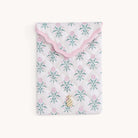 Floral patterned Blush Botanical Quilted E-Reader Case with a gold pineapple charm on a white background