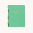 A green spiral-bound Workbook - Finances by Simplified features Finances in gold on the cover. Its perfect for money management, with Simplified printed in small white letters at the bottom to keep your financial goals on track.