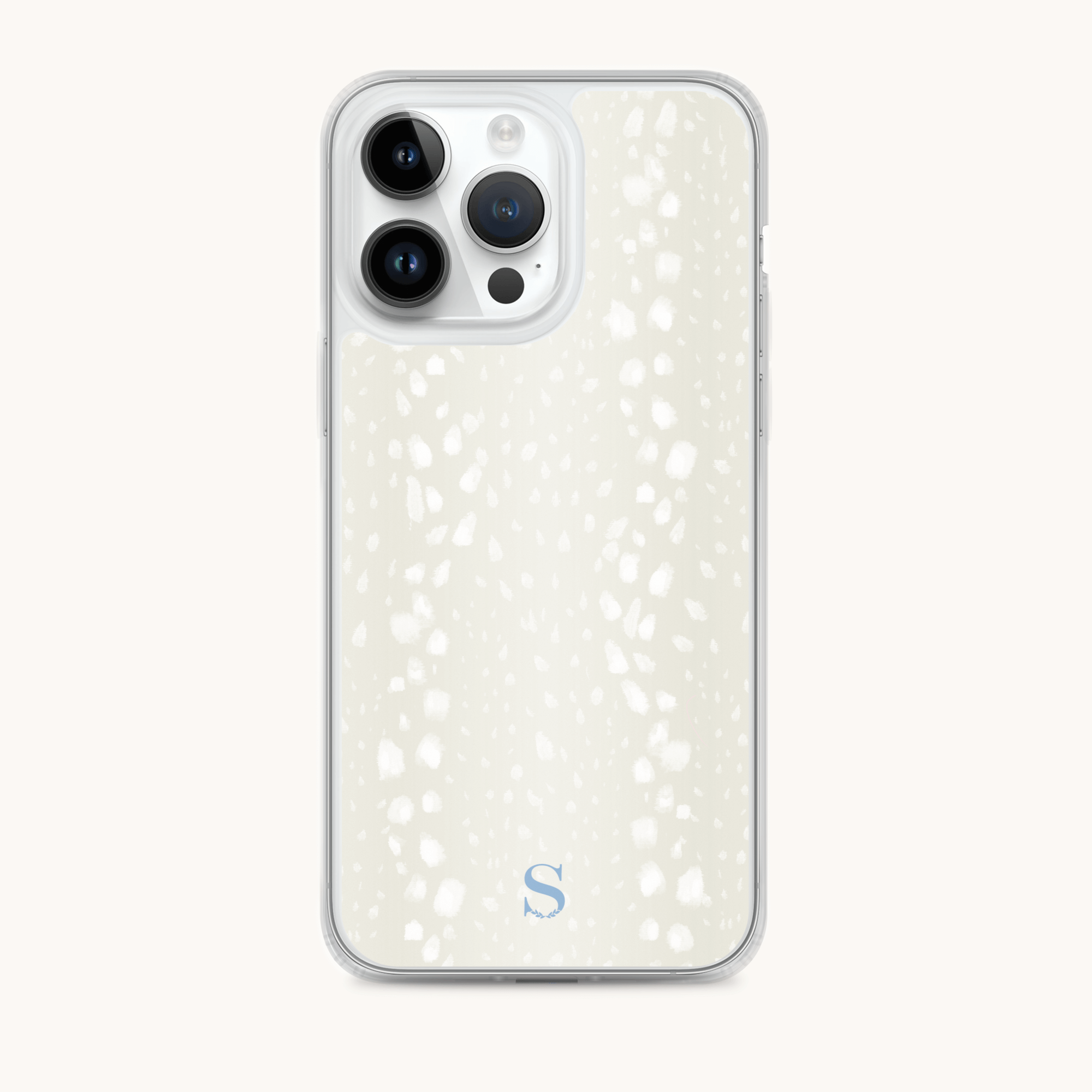 The iPhone Case - Ivory Antelope by Simplified is shown with its transparent design, revealing three camera lenses and a subtly patterned white back. A small blue S at the bottom center adds style, protecting your phone while making a statement.