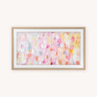 The "Happy Abstract" Frame TV Art by Simplified features pastel brushstrokes in pink, peach, yellow, and white. This dreamy digital artwork comes as an instant download or framed print with a light wood frame and white mat.