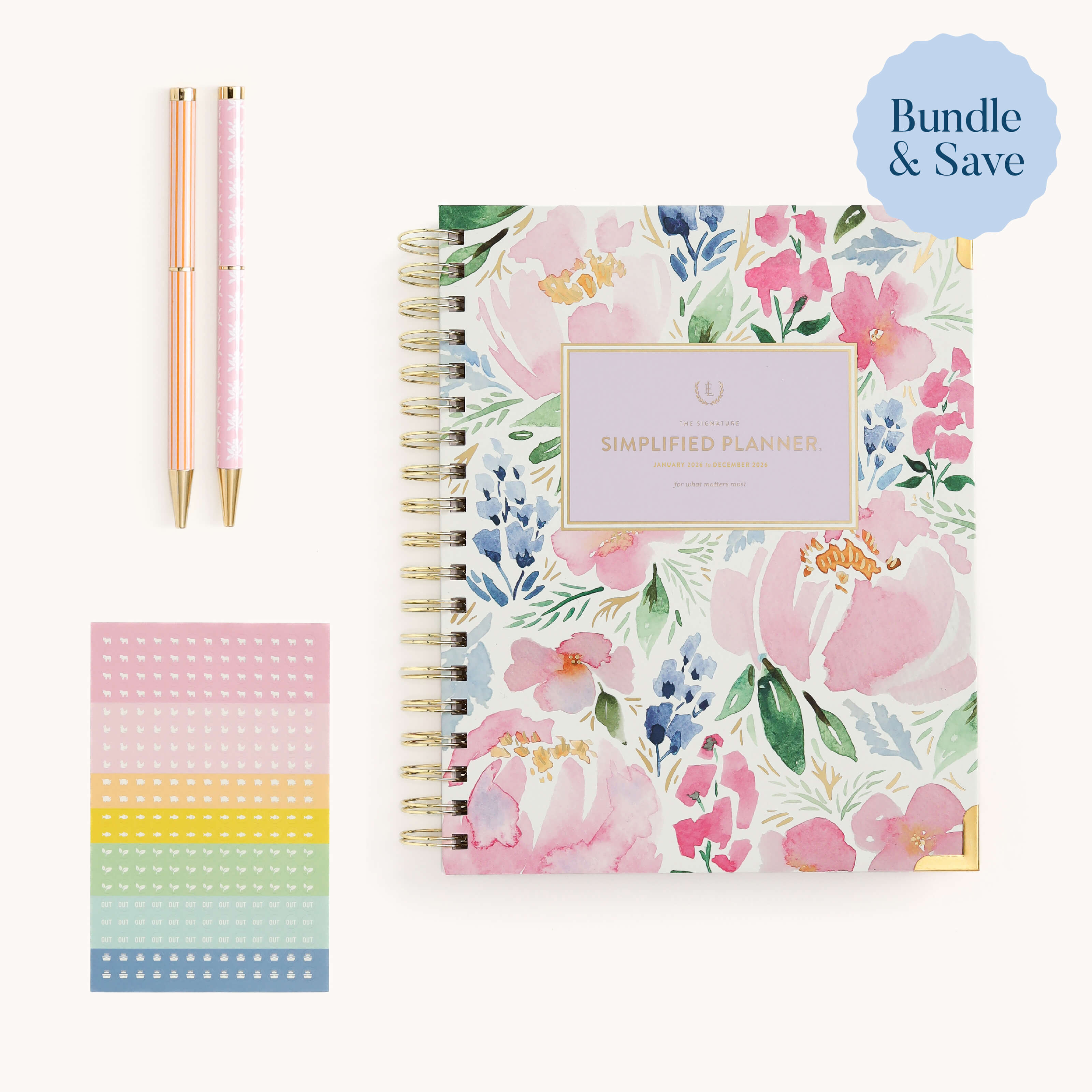The Weekly Simplified Planner Starter Bundle by Simplified® includes a floral spiral-bound planner (pink/green cover), two pink pens with gold accents, colorful stickers, and a blue “Bundle & Save” label in the corner.