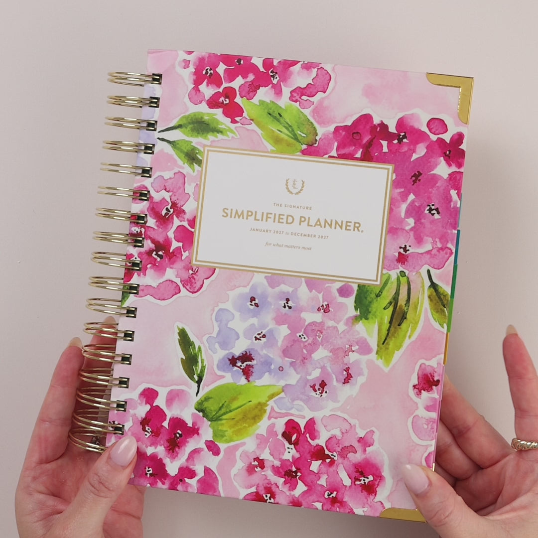 Video of the Blush Hydrangea Simplified Planner being held and opened
